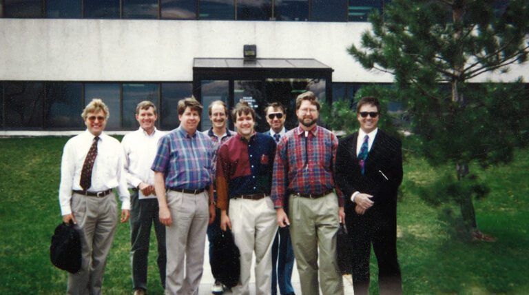 A group of men from Muller Engineering Company standing in front of a building in Lakewood, Colorado.