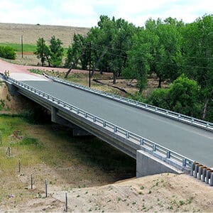 A Holtwood Road Bridge over a dirt road.