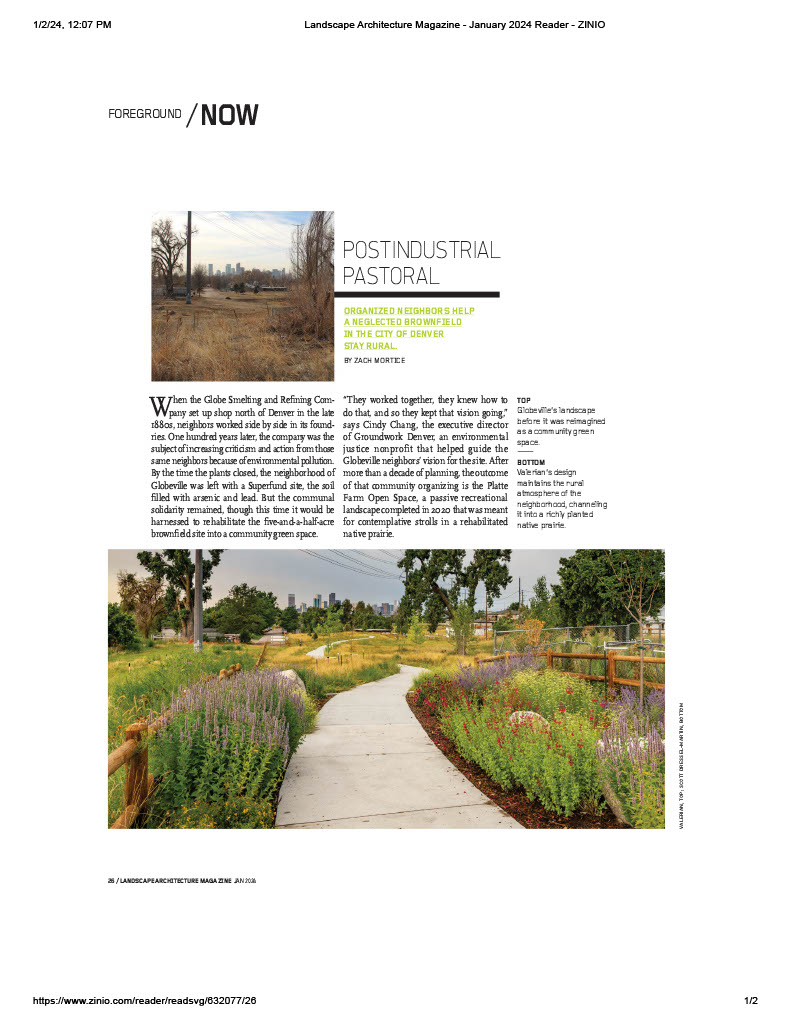 A magazine page with a picture of a landscape and a path.
