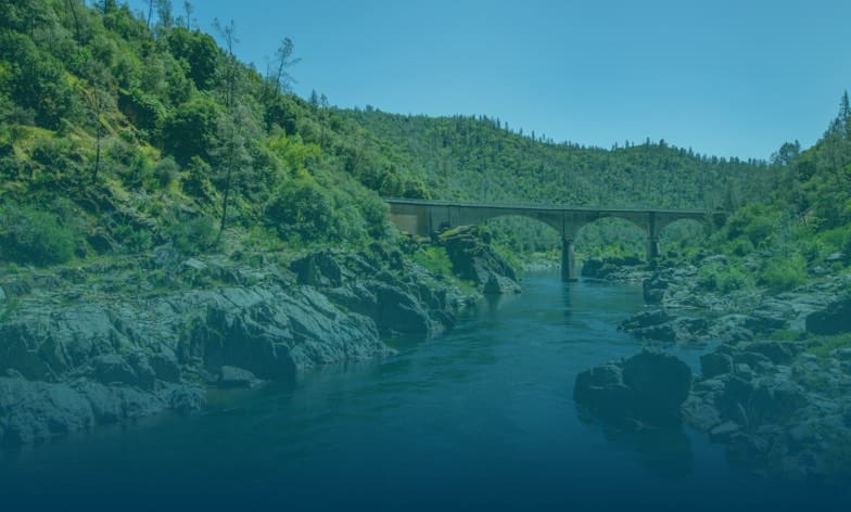 River gorge with bridge in distance